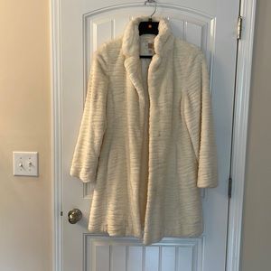 Beautiful cream faux fur coat. Never worn